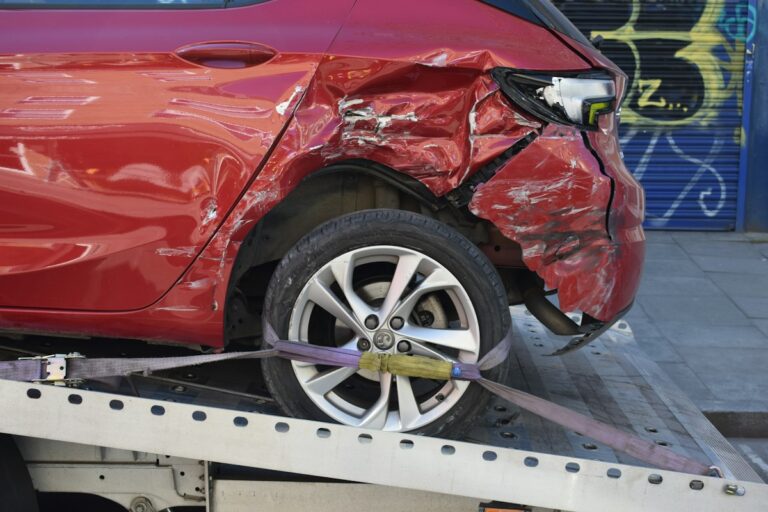 Car with a dented rear fender after a collision