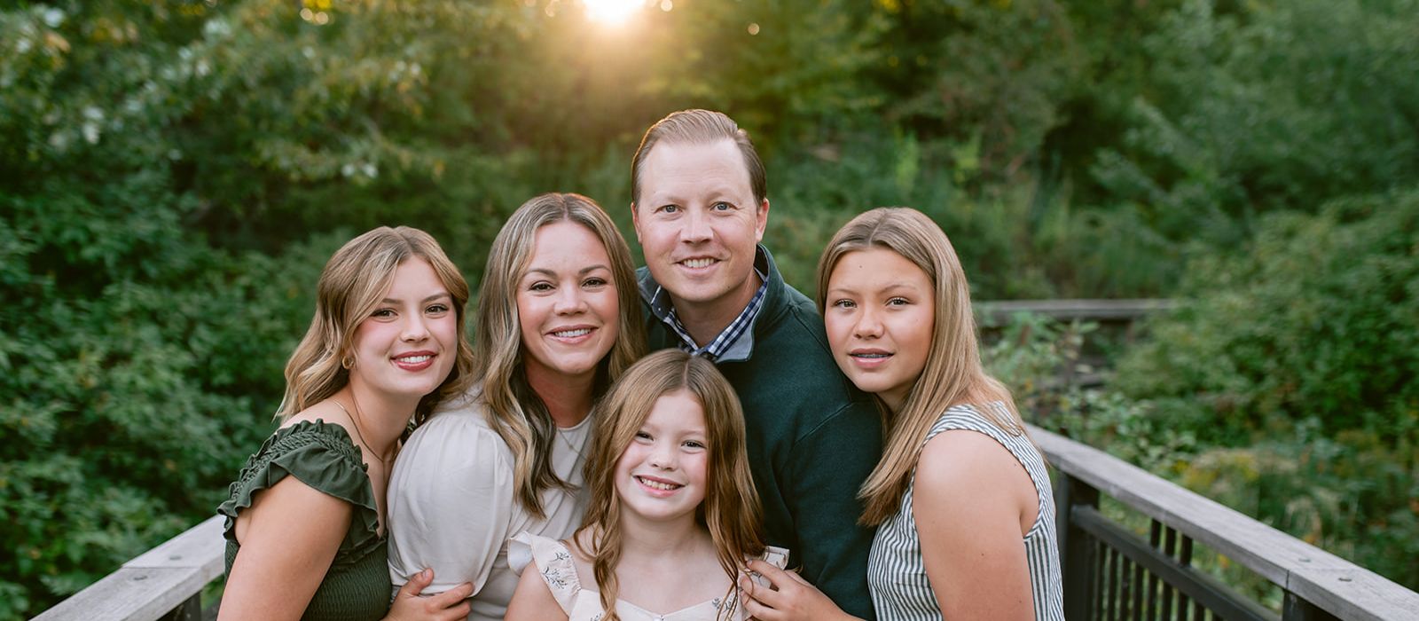 David Olson with his wife and three daughters